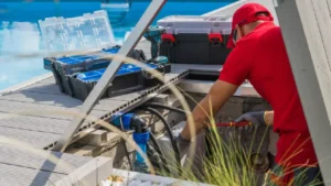 man repairing a pool equipment